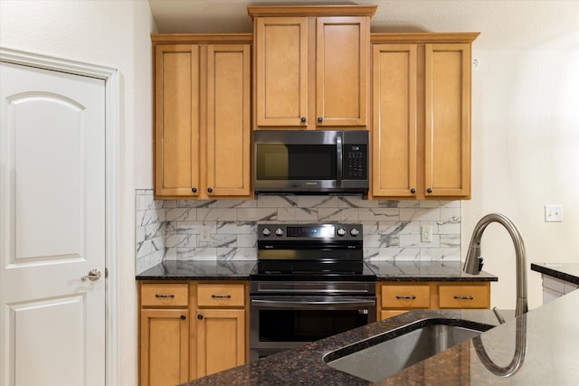 505 Osage Dr, Mckinney, TX 75071 - kitchen featuring stainless steel microwave, electric range, a sink, and backsplash