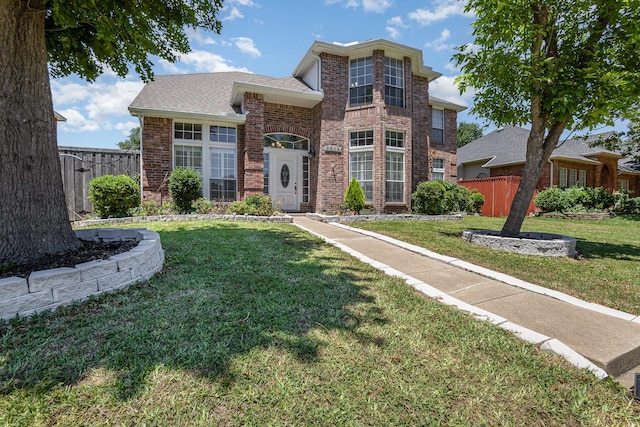 7013 Caldwell Ln, Plano, TX 75025 - traditional home featuring brick siding