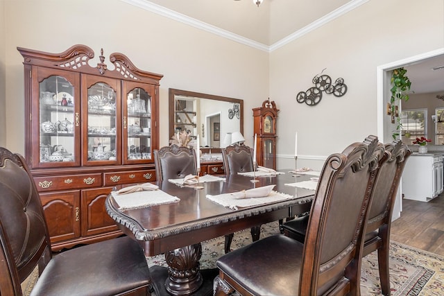 7013 Caldwell Ln, Plano, TX 75025 - dining room with crown molding and wood finished floors