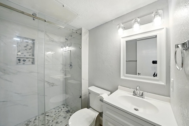 2312 Balsam Dr Unit A206, Arlington, TX 76006 - full bath featuring a textured wall, a marble finish shower, toilet, vanity, and a textured ceiling