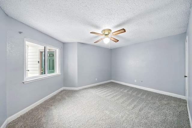 2312 Balsam Dr Unit A206, Arlington, TX 76006 - carpeted spare room featuring ceiling fan, baseboards, and a textured ceiling