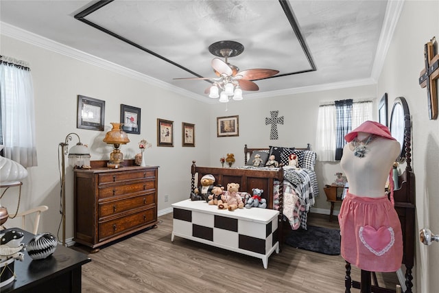 5016 Wyoming Trl, North Richland Hills, TX 76180 - bedroom with wood finished floors, ornamental molding, ceiling fan, and baseboards