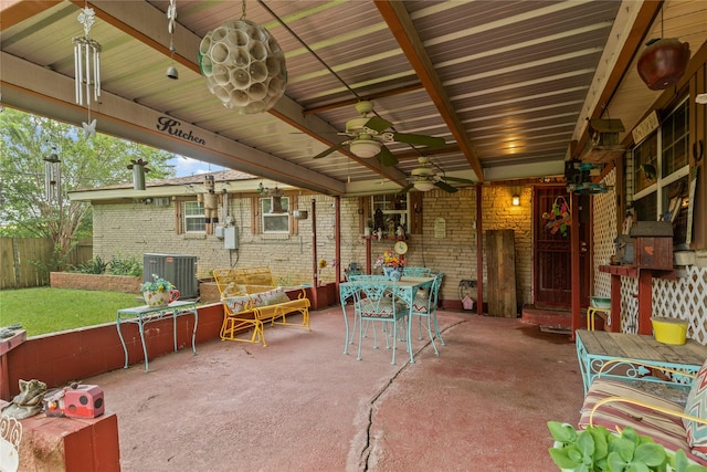 5016 Wyoming Trl, North Richland Hills, TX 76180 - view of patio with central AC, ceiling fan, and outdoor dining space