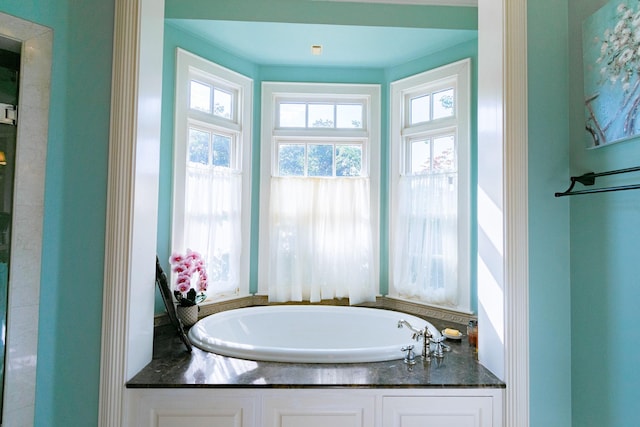 bathroom featuring a garden tub
