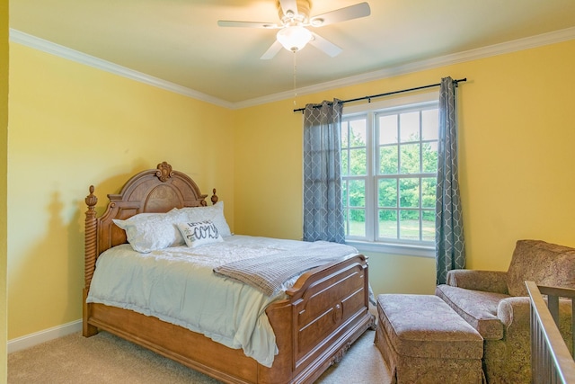 bedroom featuring ornamental molding, carpet, baseboards, and a ceiling fan