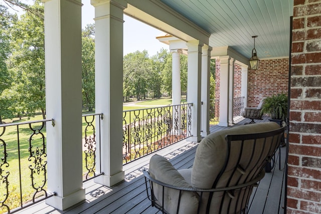 wooden deck featuring covered porch