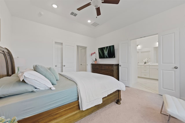 13037 Cabana Dr, Frisco, TX 75035 - bedroom featuring light colored carpet, connected bathroom, ceiling fan, and recessed lighting