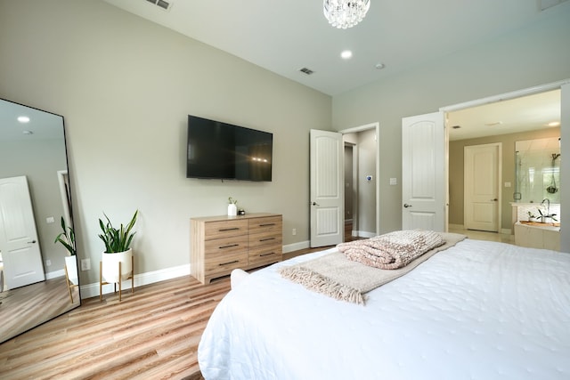 4533 Cheetah Trl, Frisco, TX 75034 - bedroom featuring light wood-style flooring, baseboards, and recessed lighting