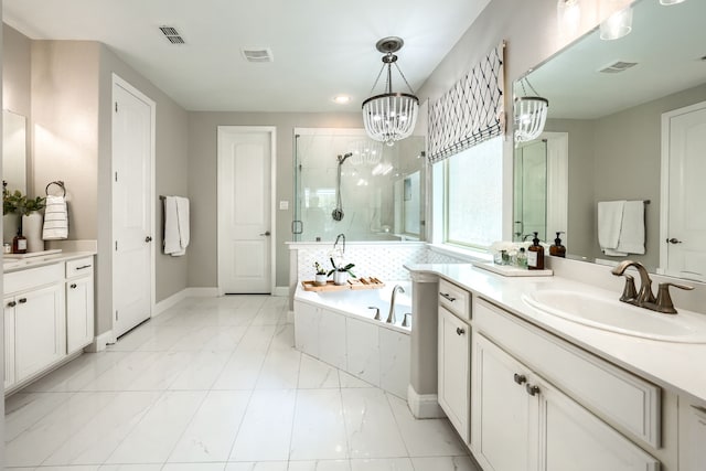 4533 Cheetah Trl, Frisco, TX 75034 - bathroom with a stall shower, vanity, a garden tub, a chandelier, and recessed lighting