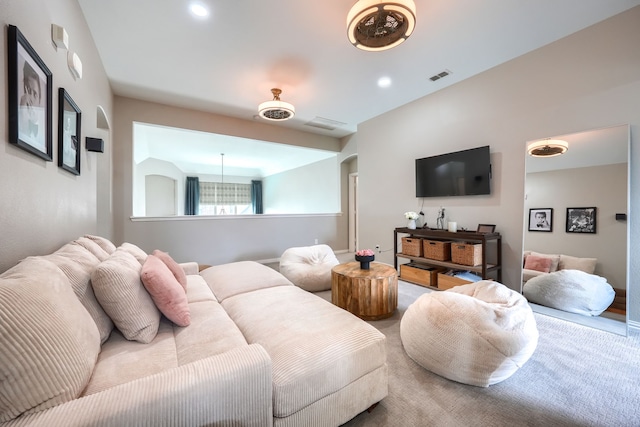 4533 Cheetah Trl, Frisco, TX 75034 - carpeted living area with arched walkways and recessed lighting