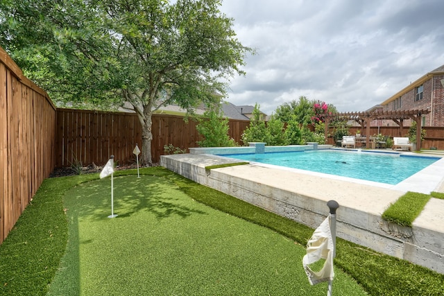 4533 Cheetah Trl, Frisco, TX 75034 - view of swimming pool with an area to practice putting, a pergola, a fenced backyard, and a patio
