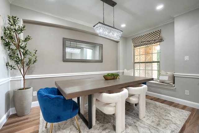 4533 Cheetah Trl, Frisco, TX 75034 - dining room with ornamental molding, wood finished floors, a chandelier, baseboards, and recessed lighting