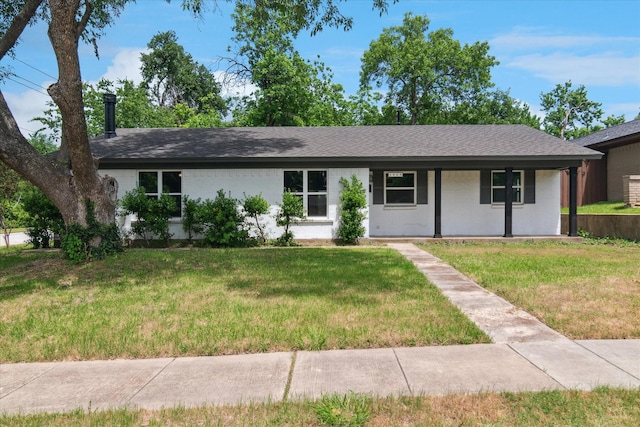 single story home with a front yard and a shingled roof