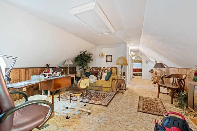 708 Lilly St, Cleburne, TX 76033 - sitting room with wooden walls, vaulted ceiling, an office area, and carpet floors