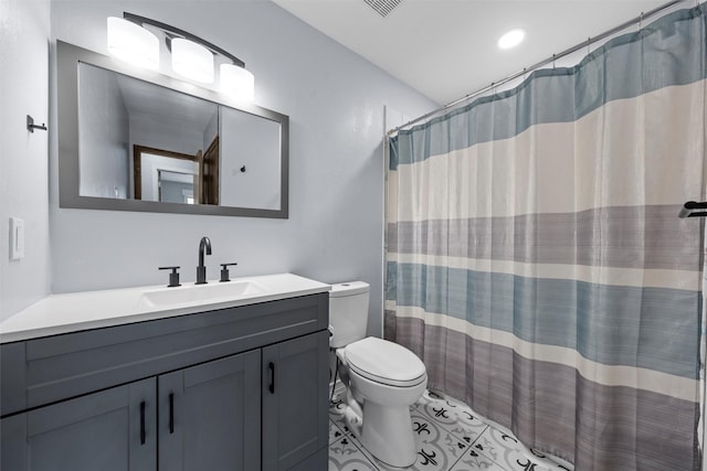 308 W Spring Valley Dr, Hewitt, TX 76643 - full bathroom featuring toilet, vanity, tile patterned floors, and a shower with shower curtain