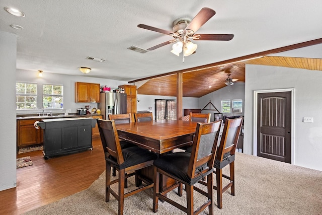 1801 Beavers Pt, Bonham, TX 75418 - dining room featuring ceiling fan, healthy amount of natural light, vaulted ceiling, and wood finished floors