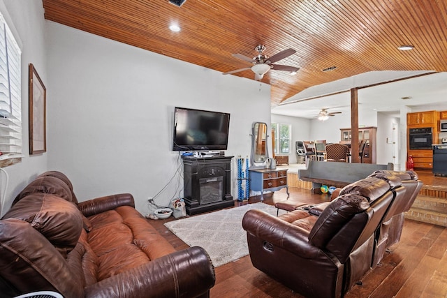 1801 Beavers Pt, Bonham, TX 75418 - living room featuring ceiling fan, wooden ceiling, lofted ceiling, a glass covered fireplace, and hardwood / wood-style flooring