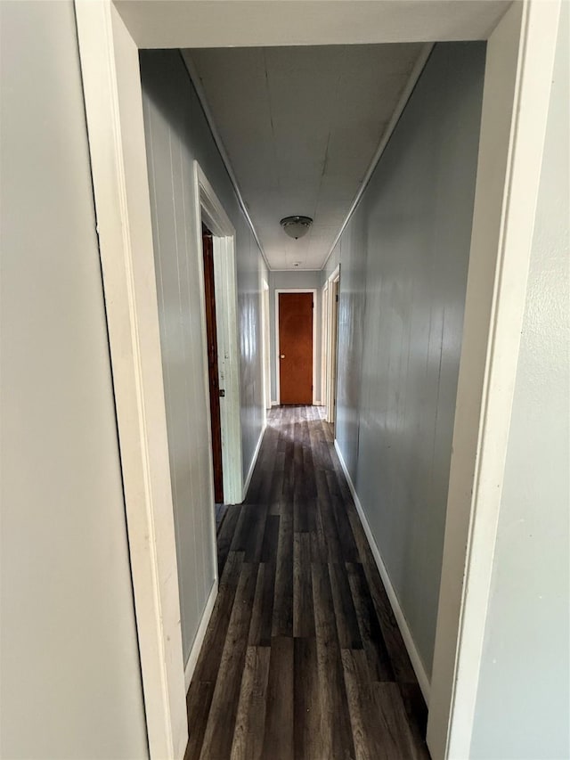 701 Perry, Santa Anna, TX 76878 - hall with dark wood finished floors and baseboards