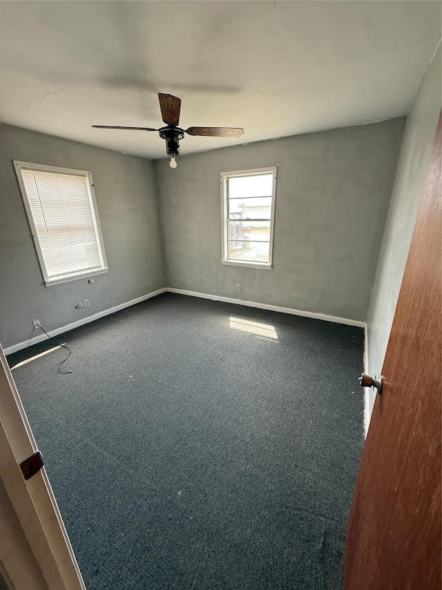 701 Perry, Santa Anna, TX 76878 - carpeted spare room with a ceiling fan and baseboards