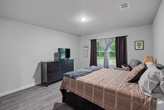 111 Peace Lily Way, Tolar, TX 76476 - bedroom featuring light wood-type flooring, baseboards, and recessed lighting