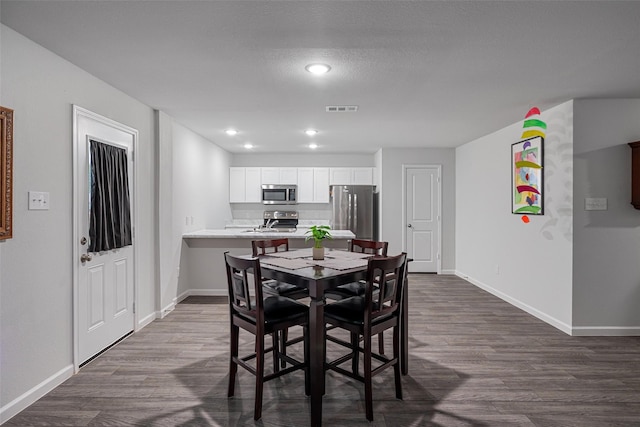111 Peace Lily Way, Tolar, TX 76476 - dining room featuring baseboards, dark wood-style flooring, and recessed lighting
