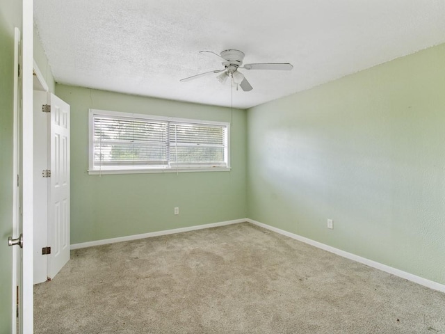 110 Twin Cir, Wortham, TX 76693 - carpeted spare room with ceiling fan and baseboards