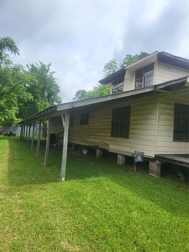 1724 Dickinson St, Shreveport, LA 71103 - view of home's exterior with a yard