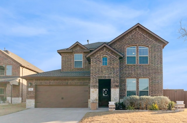 901 Violet Way, Celina, TX 75009 - traditional-style home featuring brick siding, driveway, a shingled roof, fence, and an attached garage