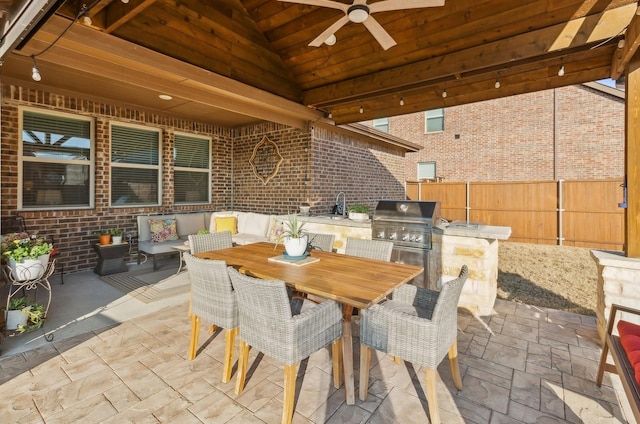 901 Violet Way, Celina, TX 75009 - view of patio featuring exterior kitchen, fence, a ceiling fan, a grill, and outdoor dining area