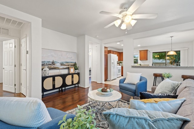 7735 Whirlwind Dr, Frisco, TX 75036 - living room with wood finished floors and a ceiling fan