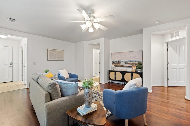 7735 Whirlwind Dr, Frisco, TX 75036 - living room with a ceiling fan, wood finished floors, and baseboards