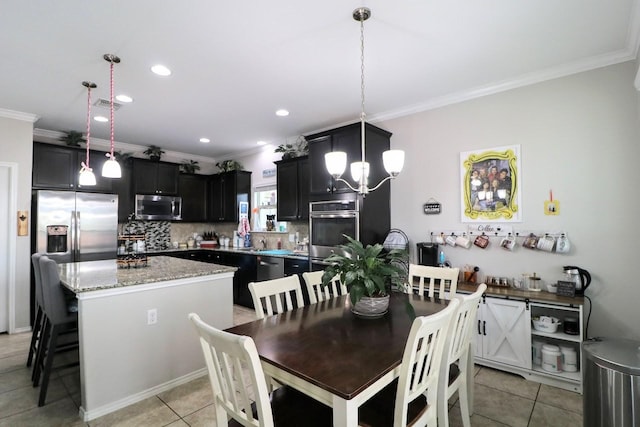 5516 Tama Dr, Waco, TX 76708 - dining space with crown molding, light tile patterned floors, a chandelier, and recessed lighting