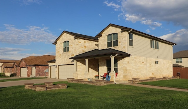 5516 Tama Dr, Waco, TX 76708 - rear view of house with stone siding, covered porch, an attached garage, a lawn, and driveway