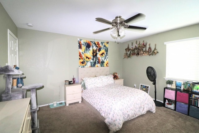 5516 Tama Dr, Waco, TX 76708 - bedroom with carpet flooring, baseboards, and ceiling fan