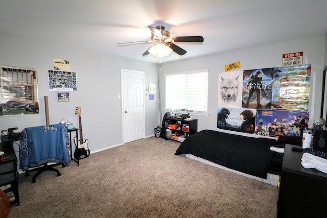 5516 Tama Dr, Waco, TX 76708 - bedroom featuring carpet floors, a ceiling fan, and baseboards