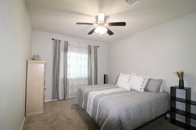 5516 Tama Dr, Waco, TX 76708 - carpeted bedroom with baseboards and a ceiling fan