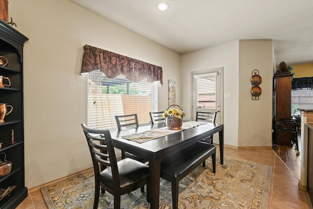 5139 Crystal Lake Ave, Krum, TX 76249 - dining space with light tile patterned floors and recessed lighting