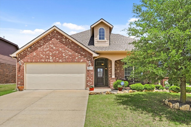 5139 Crystal Lake Ave, Krum, TX 76249 - traditional-style house featuring brick siding, a front lawn, concrete driveway, roof with shingles, and a garage