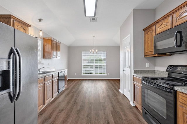1502 Jacksons Run, Greenville, TX 75402 - kitchen with black appliances, a sink, dark wood-style flooring, a chandelier, and baseboards