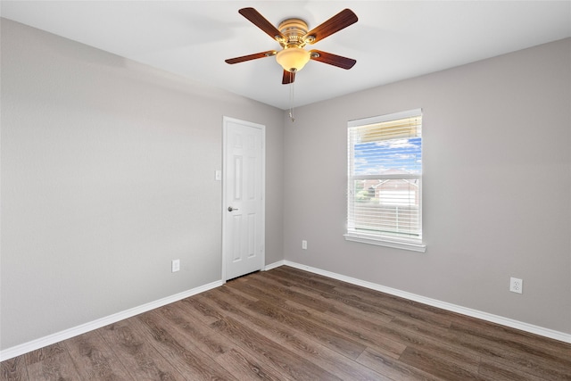 1502 Jacksons Run, Greenville, TX 75402 - unfurnished room featuring dark wood finished floors, baseboards, and ceiling fan