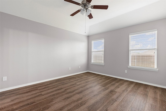 1502 Jacksons Run, Greenville, TX 75402 - unfurnished room with dark wood-style floors, a ceiling fan, and baseboards