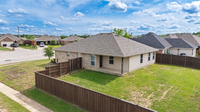 1502 Jacksons Run, Greenville, TX 75402 - rear view of property featuring a shingled roof and a residential view