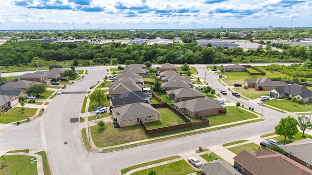 1502 Jacksons Run, Greenville, TX 75402 - aerial perspective of suburban area featuring a tree filled landscape