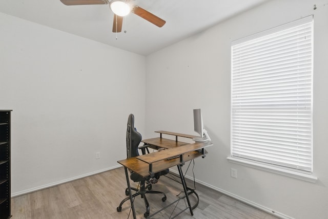 10957 Colonial Heights Ln, Fort Worth, TX 76179 - office featuring ceiling fan, wood finished floors, and baseboards