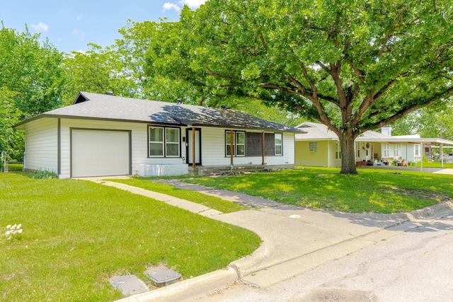5205 Stephanie Dr, Haltom City, TX 76117 - single story home with an attached garage, a front lawn, and driveway