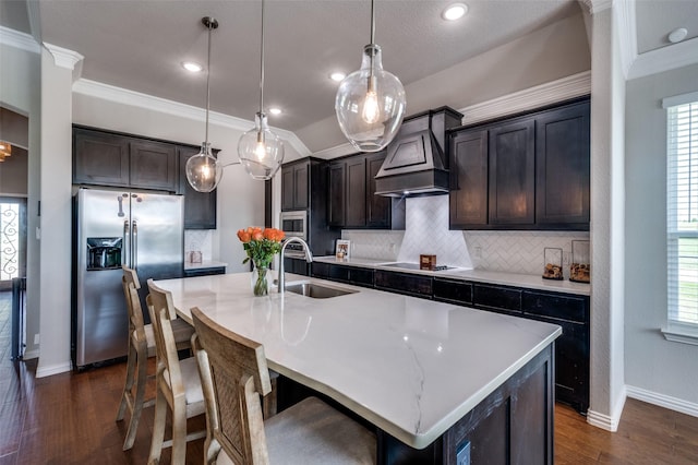 13400 Summer Moon Trl, Ponder, TX 76259 - kitchen featuring stainless steel fridge with ice dispenser, a sink, custom exhaust hood, backsplash, and baseboards