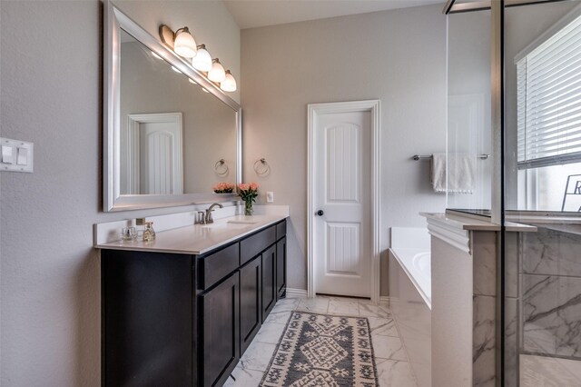 13400 Summer Moon Trl, Ponder, TX 76259 - full bathroom featuring marble finish floors, a bath, vanity, and baseboards