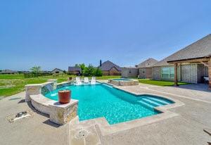 2575 Wincrest Dr, Rockwall, TX 75032 - view of swimming pool featuring a patio and a pool with connected hot tub