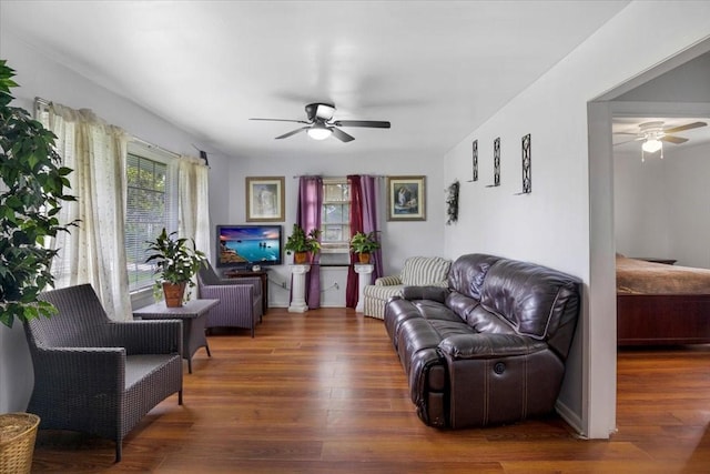 116 S Barron St, Arp, TX 75750 - living room featuring ceiling fan and wood finished floors