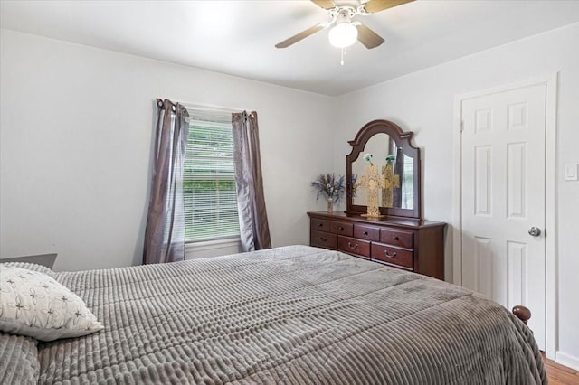 116 S Barron St, Arp, TX 75750 - bedroom featuring a ceiling fan and wood finished floors